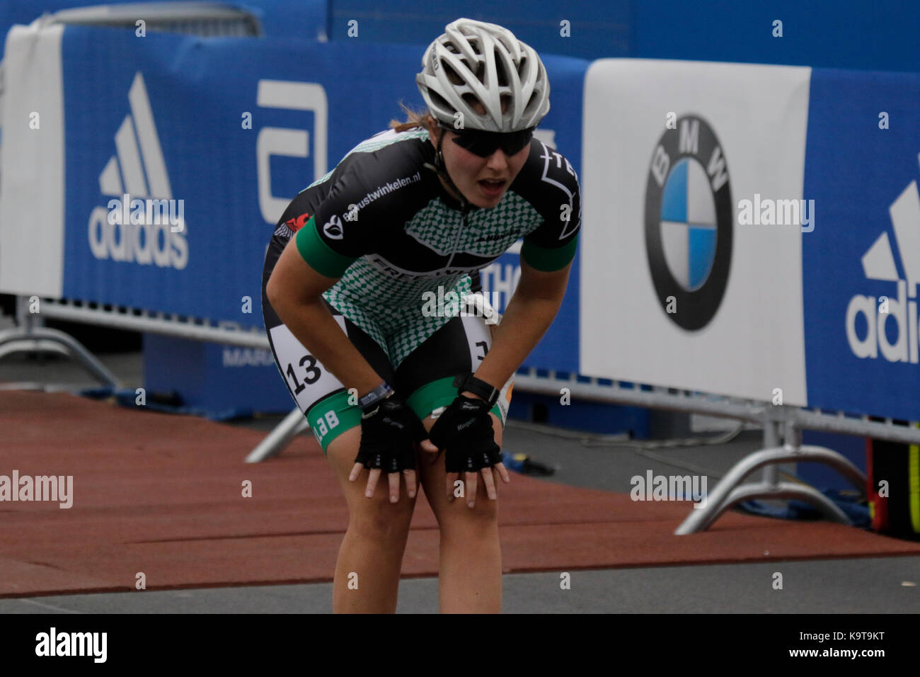 Berlin, Germany. 23rd Sep, 2017. Skaters are exhausted after the race. Over 5,500 skater took part in the 2017 BMW Berlin Marathon Inline skating race, a day ahead of the Marathon race. Bart Swings from Belgium won the race in 58:42 for the 5th year in a row. Credit: Michael Debets/Pacific Press/Alamy Live News Stock Photo