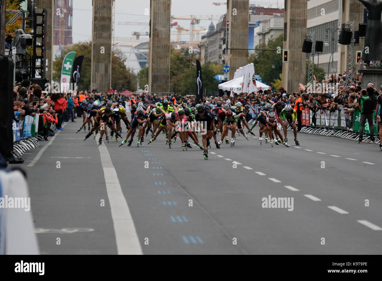 Berlin, Germany. 23rd Sep, 2017. Second place Patxi Peula from Spain crosses the finishing line.Skaters race the last meters of the course from the Brandenburg Gate to the finishing line. Over 5,500 skater took part in the 2017 BMW Berlin Marathon Inline skating race, a day ahead of the Marathon race. Bart Swings from Belgium won the race in 58:42 for the 5th year in a row. Credit: Michael Debets/Pacific Press/Alamy Live News Stock Photo