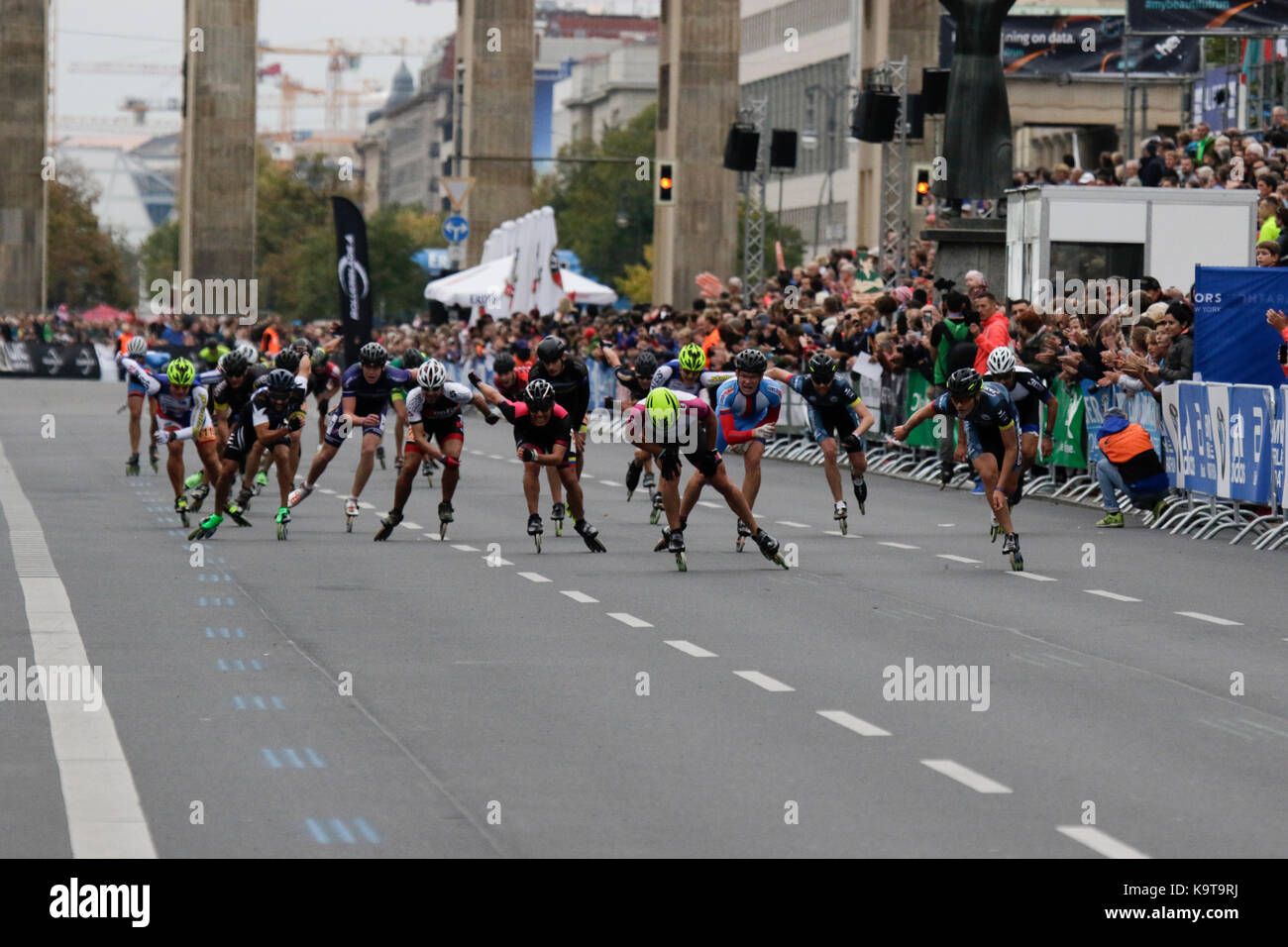 Berlin, Germany. 23rd Sep, 2017. Second place Patxi Peula from Spain crosses the finishing line.Skaters race the last meters of the course from the Brandenburg Gate to the finishing line. Over 5,500 skater took part in the 2017 BMW Berlin Marathon Inline skating race, a day ahead of the Marathon race. Bart Swings from Belgium won the race in 58:42 for the 5th year in a row. Credit: Michael Debets/Pacific Press/Alamy Live News Stock Photo