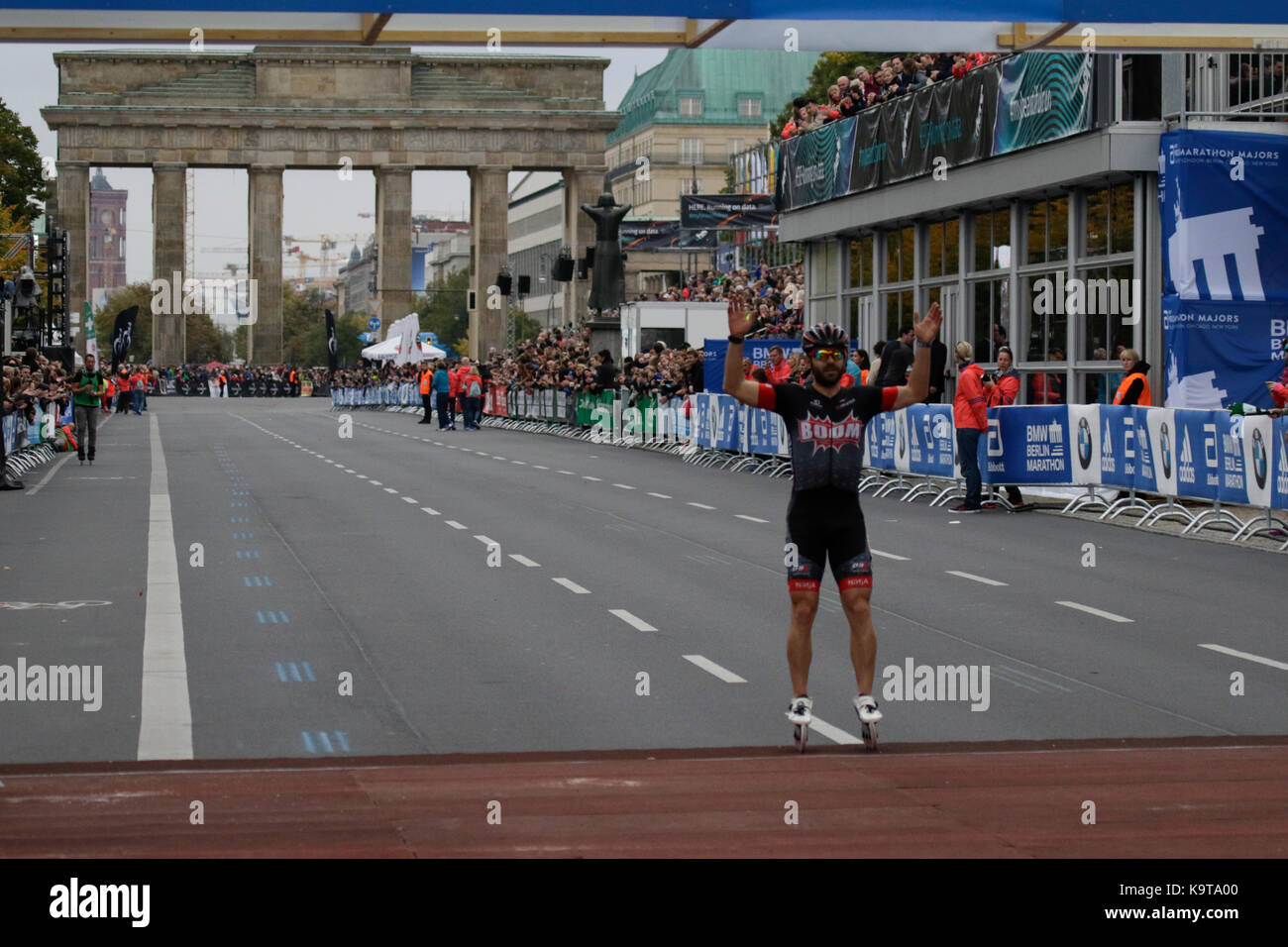 Berlin, Germany. 23rd Sep, 2017. Second place Patxi Peula from Spain crosses the finishing line. Over 5,500 skater took part in the 2017 BMW Berlin Marathon Inline skating race, a day ahead of the Marathon race. Bart Swings from Belgium won the race in 58:42 for the 5th year in a row. Credit: Michael Debets/Pacific Press/Alamy Live News Stock Photo