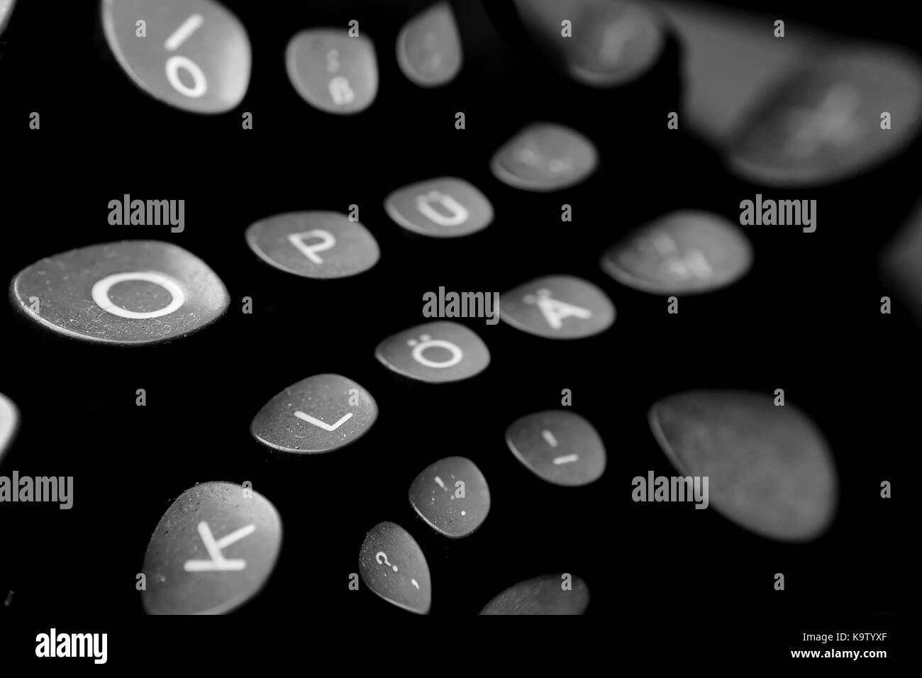 Background in the style of pouring letters Stock Photo - Alamy