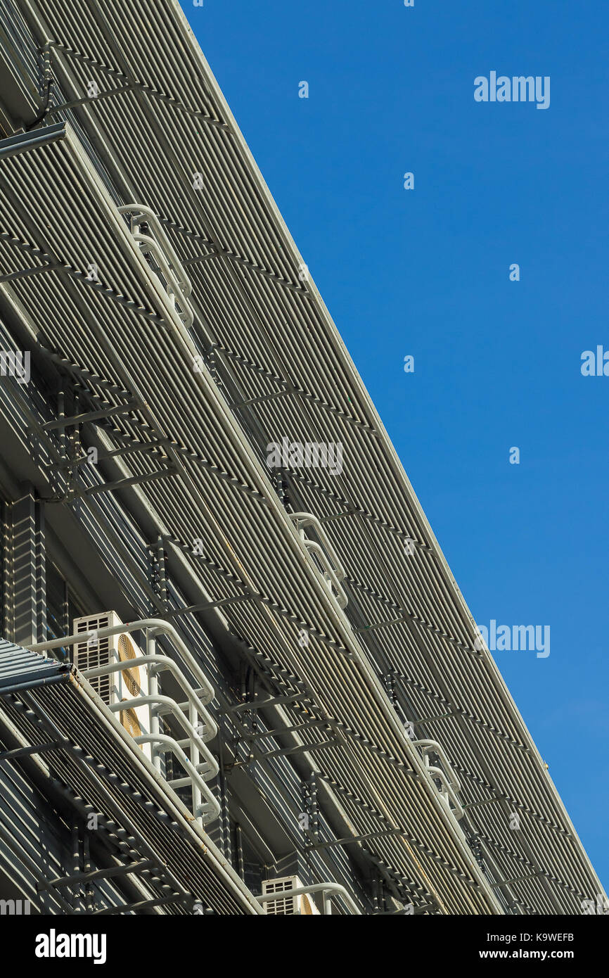 Modern Office Building against blue sky background Stock Photo - Alamy