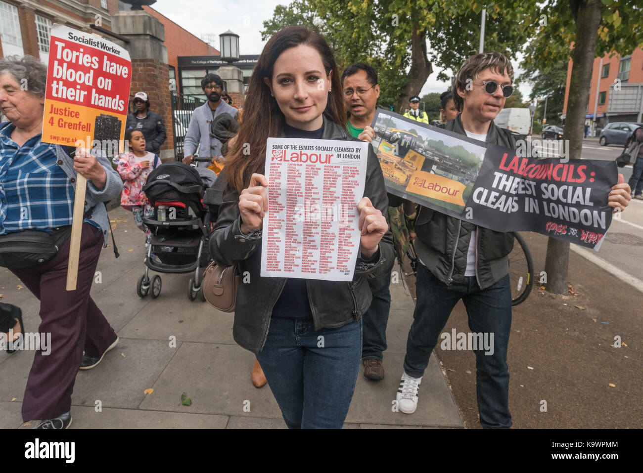 London, UK. 23rd Sep, 2017. London, UK. 23rd September 2017. A marcher holds a list produced by Architects for Social Housing of well over a hundred London estates already targeted for social cleansing by Labour councils on the march in North London from a rally in Tottenham to Finsbury Park against the so called Haringey Development Vehicle, under which Haringey Council is making a huge transfer of council housing to Australian multinational Lendlease. This will result in the imminent demolition of over 1,300 council homes on the Northumberland Park estate, followed by similar loss of s Stock Photo