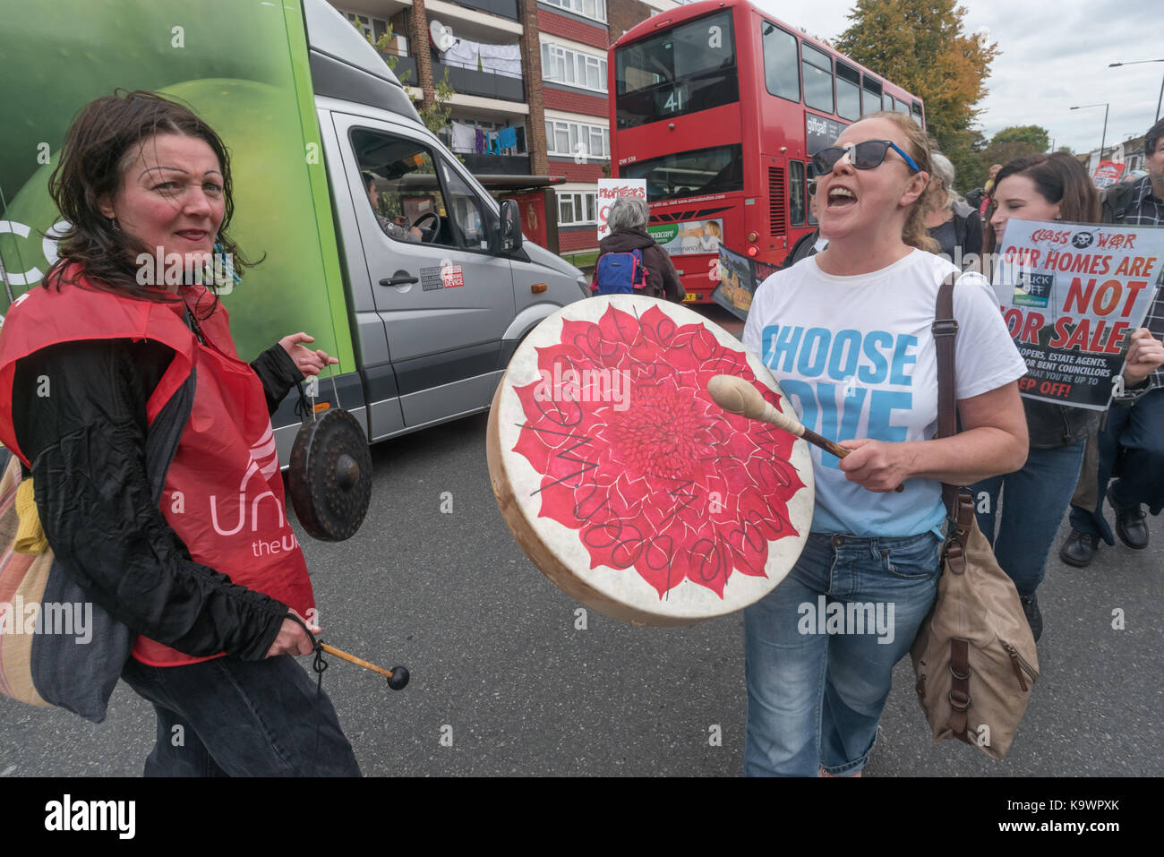 London, UK. 23rd Sep, 2017. London, UK. 23rd September 2017. Two women with drums on the march in North London from a rally in Tottenham to Finsbury Park against the so called Haringey Development Vehicle, under which Haringey Council is making a huge transfer of council housing to Australian multinational Lendlease. This will result in the imminent demolition of over 1,300 council homes on the Northumberland Park estate, followed by similar loss of social housing across the whole of the borough. At Â£2 billion, his is the largest giveaway of council housing and assets to a private corpo Stock Photo