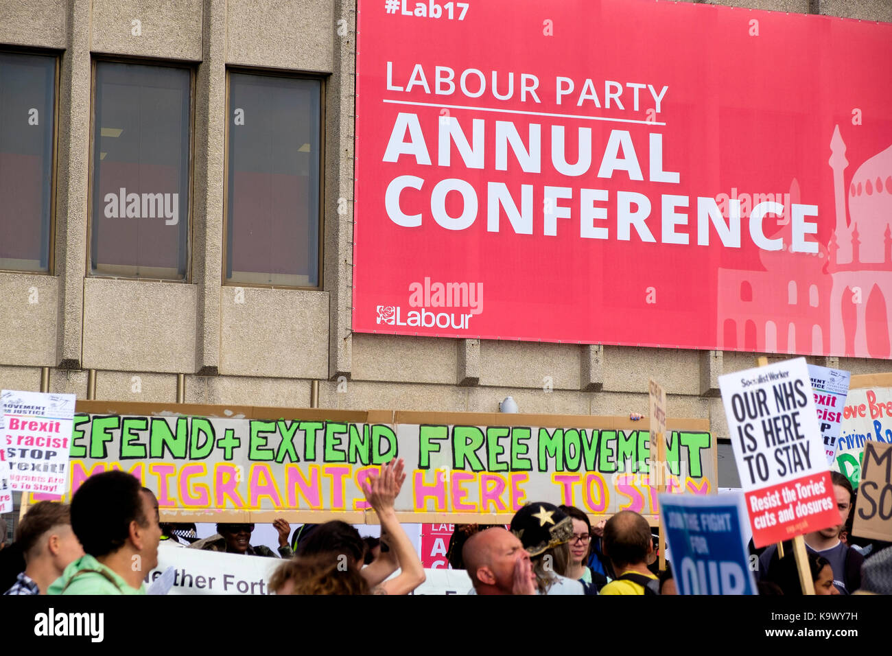 Brighton Centre, Brighton, UK - 24 September 2017: Protestors in a demonstration organised by the Movement for Justice demanding the free movement of people post Brexit are joined by protesters from a larger pro-NHS demonstration outside the venue of the Labour Party Conference 2017. Credit: Scott Hortop/Alamy Live News Stock Photo