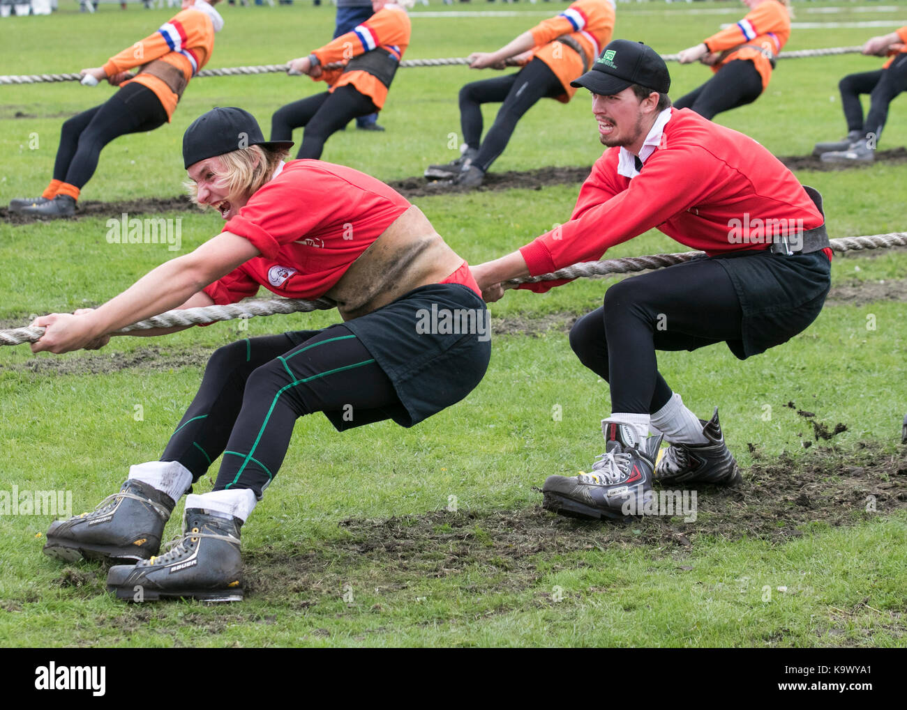 Teamwork, rope challenge, sporting event at Southport, Merseyside, UK