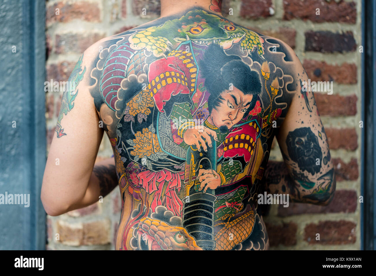 London, UK. 24th September 2017. A heavily tattooed man at the London