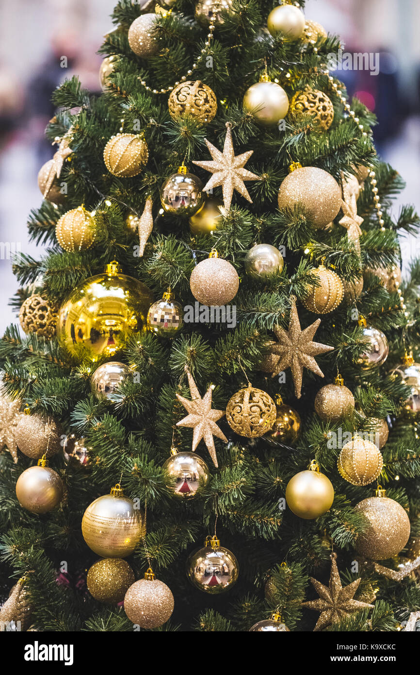 Christmas tree decorations in gold tones with lots of beautiful shiny