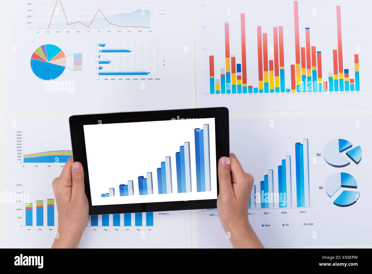 Close-up Of Person Analyzing Financial Graph Diagram On Digital Tablet ...