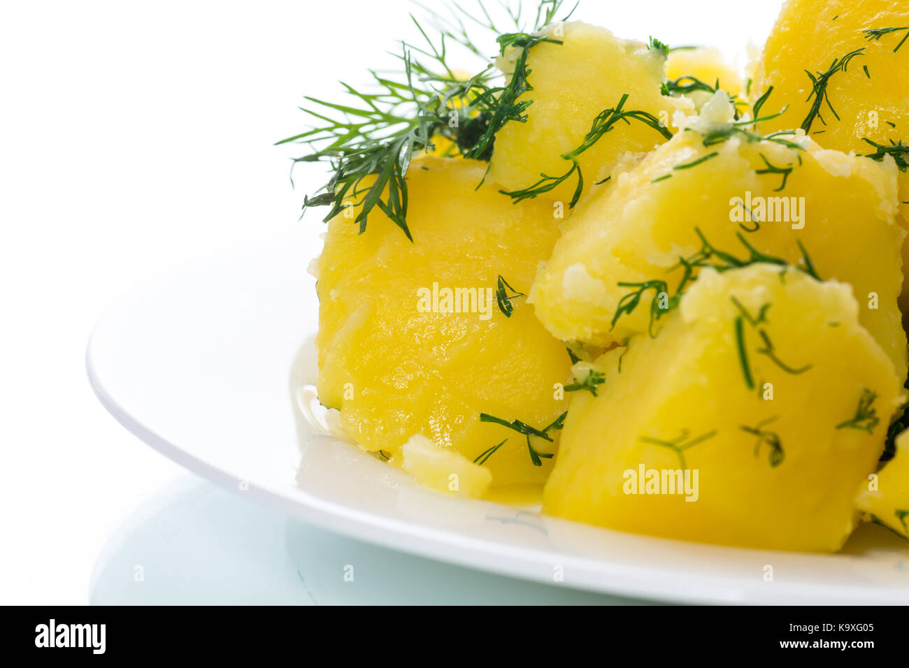 Boiled potatoes with dill in a plate Stock Photo Alamy