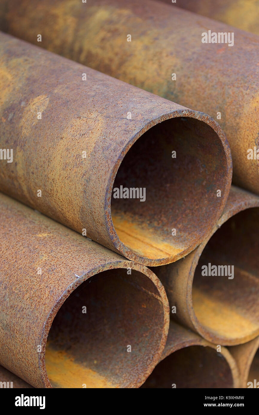 Metal profile pipe of round section in packs at the warehouse of metal ...