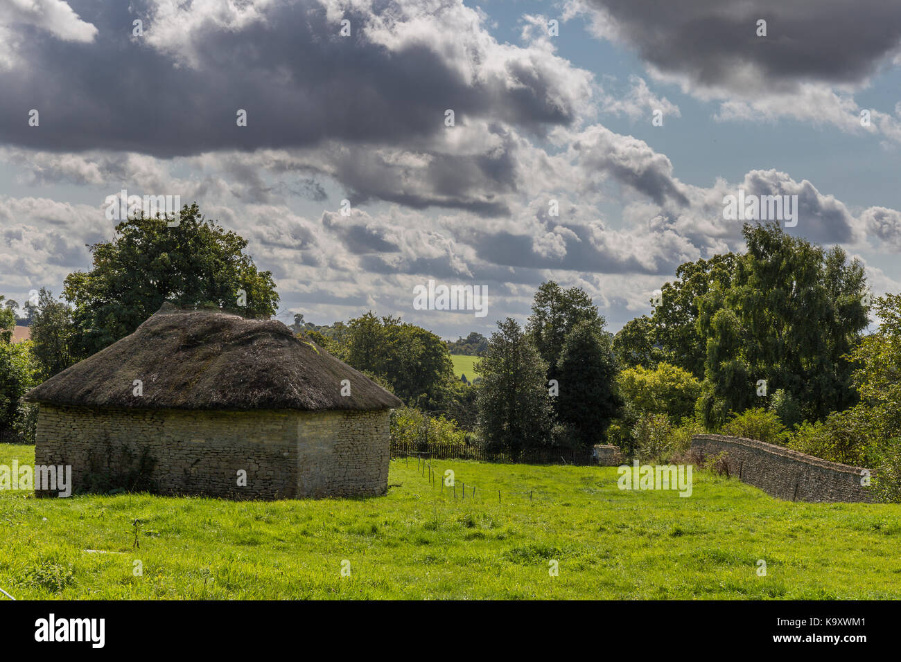 Barn with thatched roof in Sherborn Park Stock Photo
