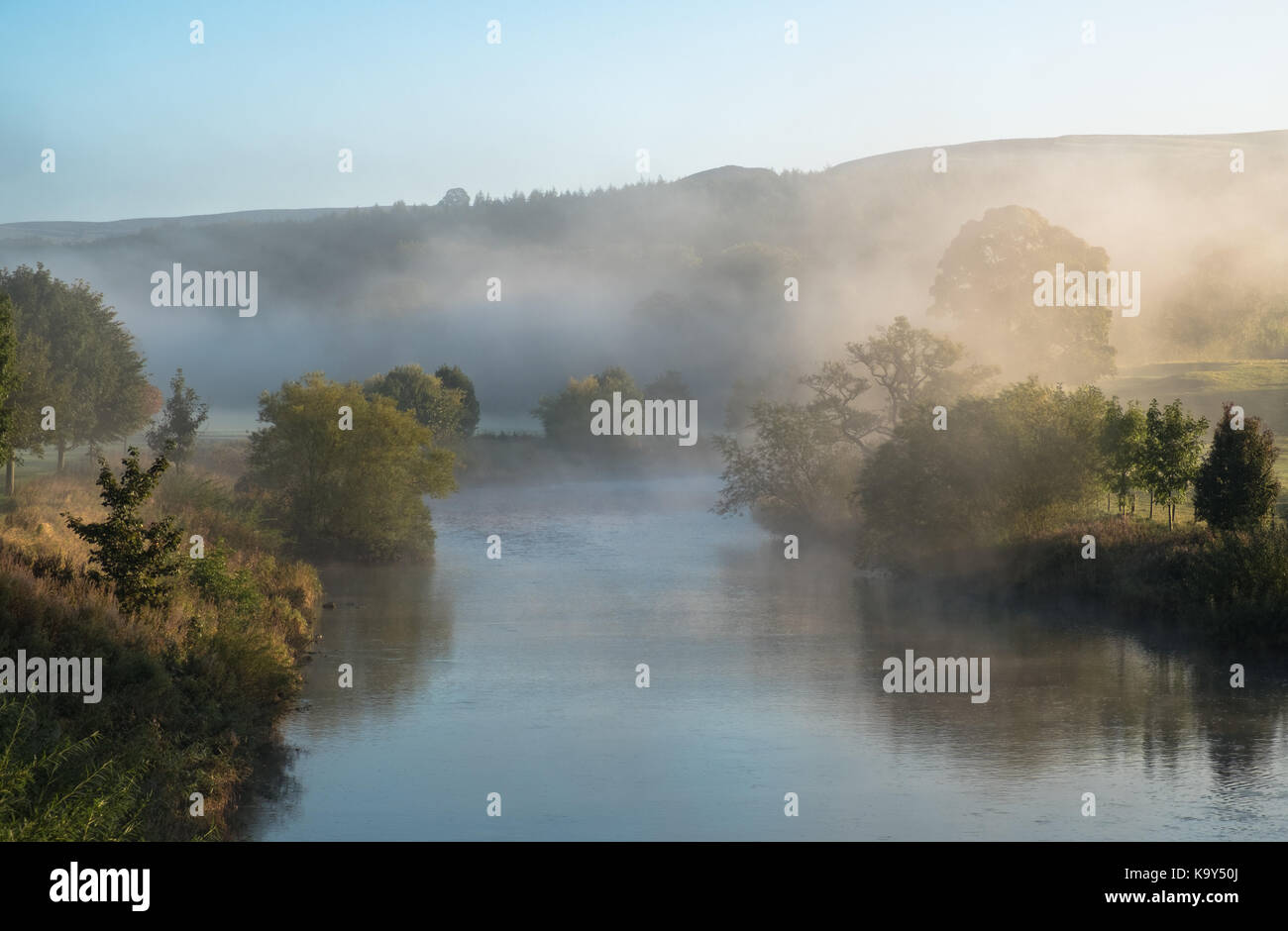 Stunning misty Autumn morning at Bolton Bridge near Bolton Abbey, North Yorkshire Stock Photo