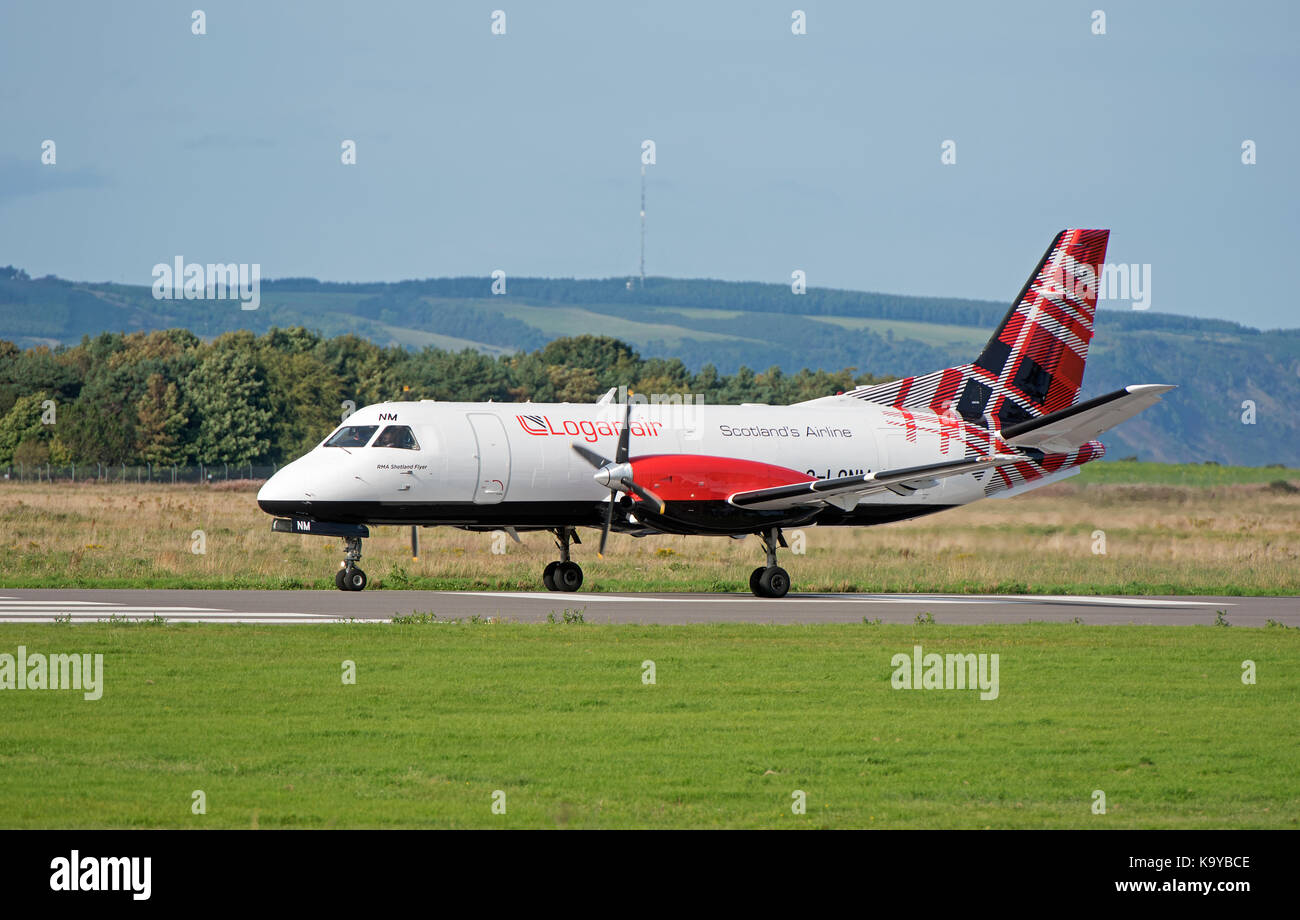 Loganair G-LGNN taxining prior to take off from Inverness Dalcross Airport. in the Scottish Highlands. Stock Photo
