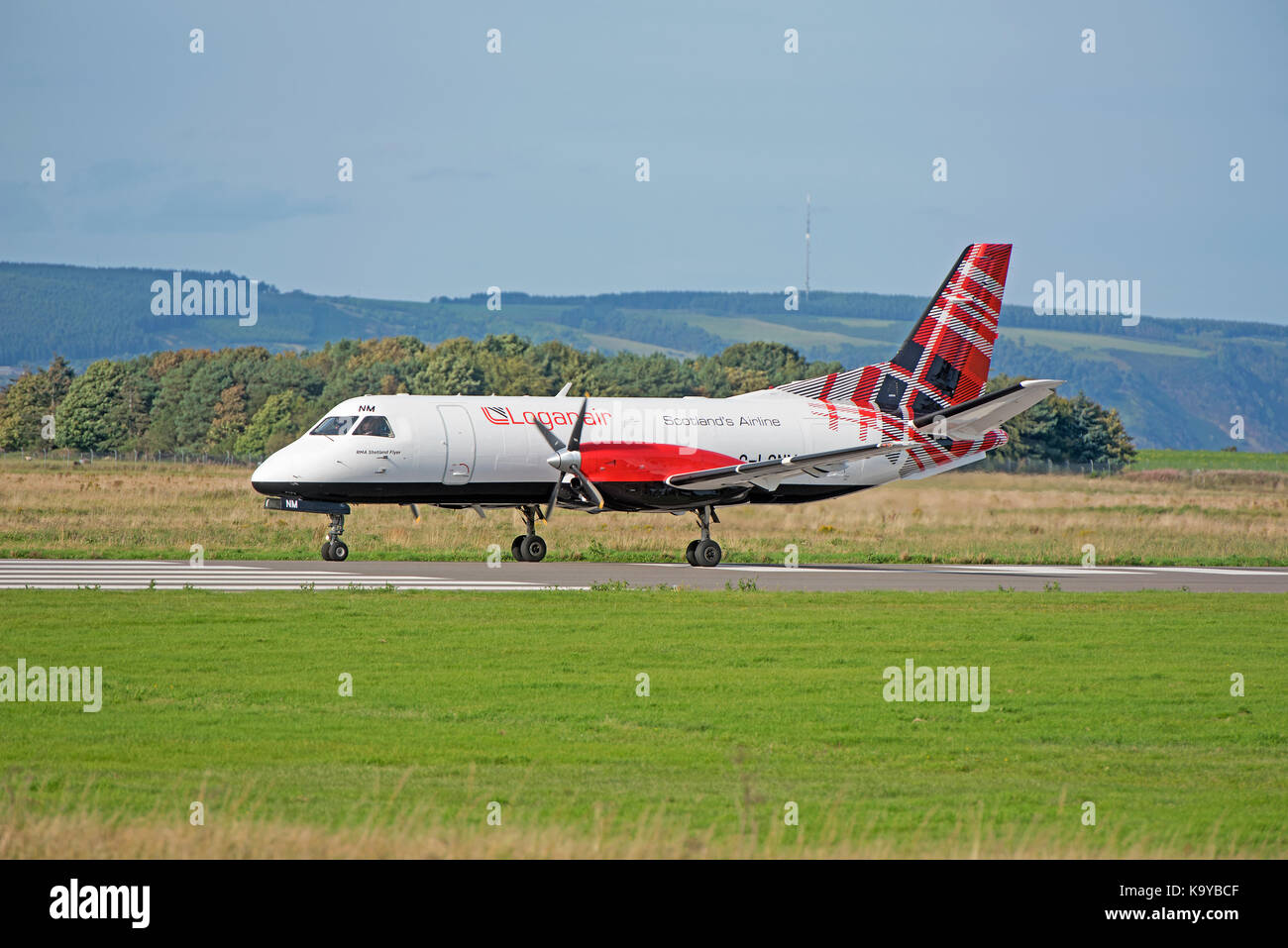 Loganair G-LGNN taxining prior to take off from Inverness Dalcross Airport. in the Scottish Highlands. Stock Photo