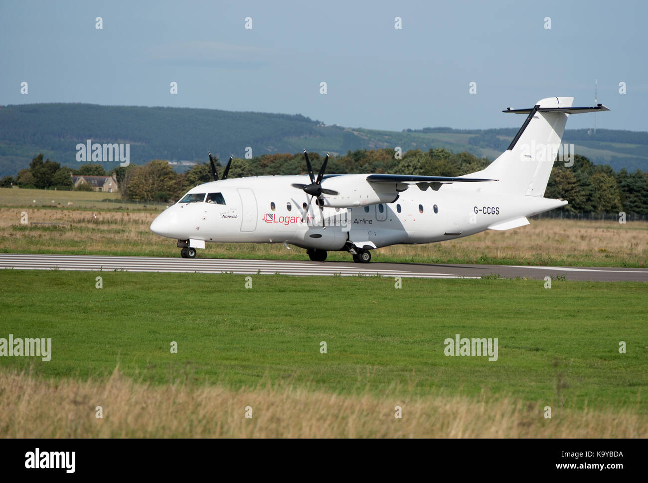 A Dornier 328-100 from the Loganair fleet, Scotland's Airline departing from Inverness on an internal flight. Stock Photo