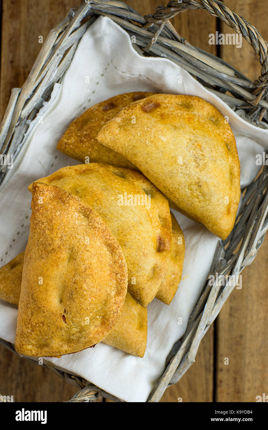 Freshly baked Empanadas Turnover Pies with vegetable cheese filling in