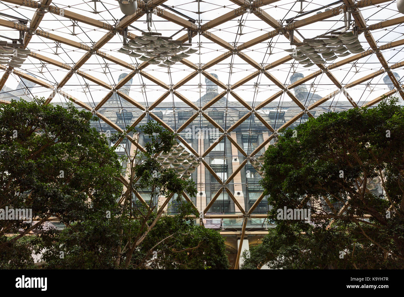 The glass roof structure and atrium at Portcullis House, Westminster, London England UK Stock Photo