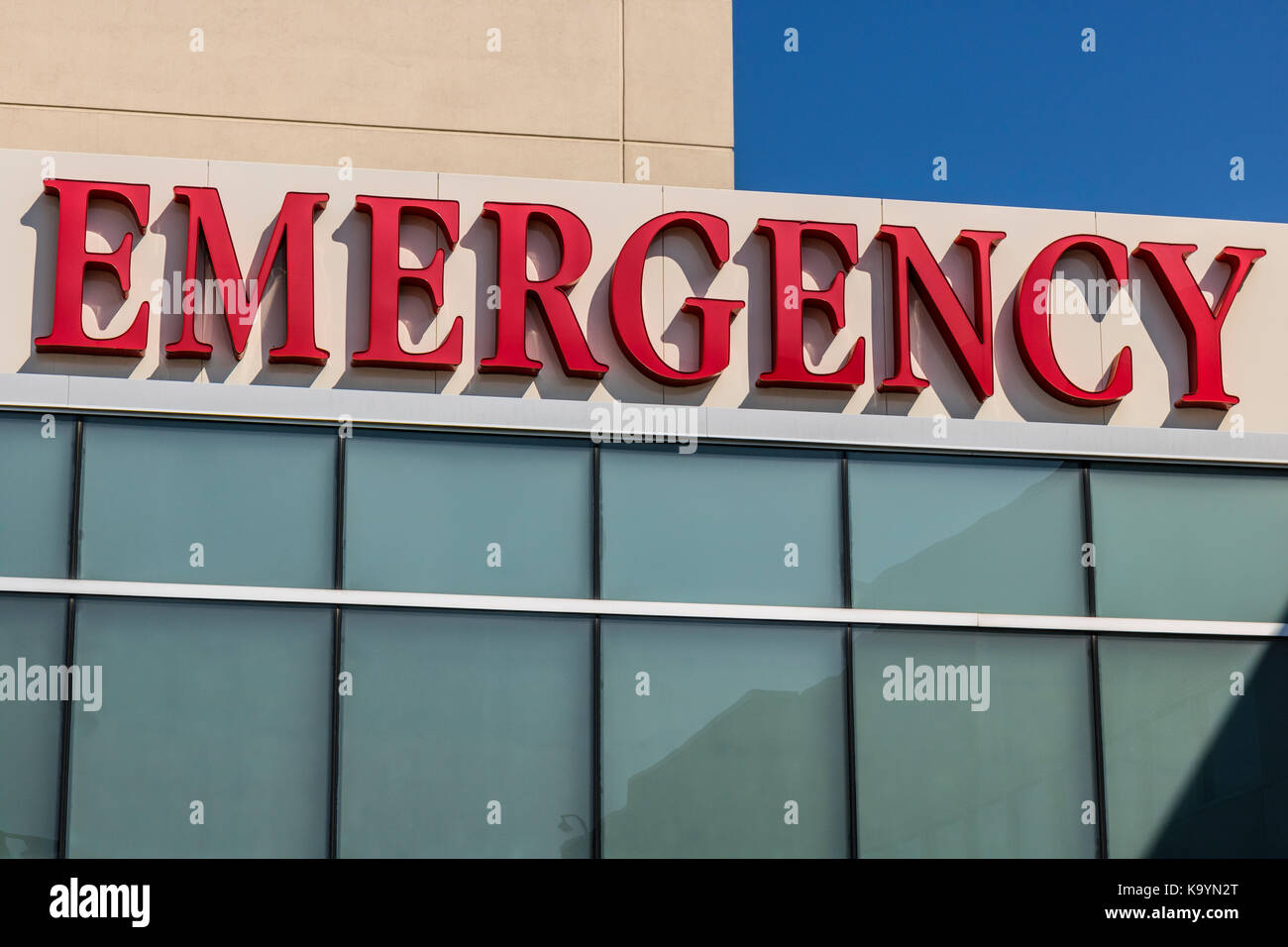 Red Emergency Entrance Sign for a Local Hospital XIX Stock Photo