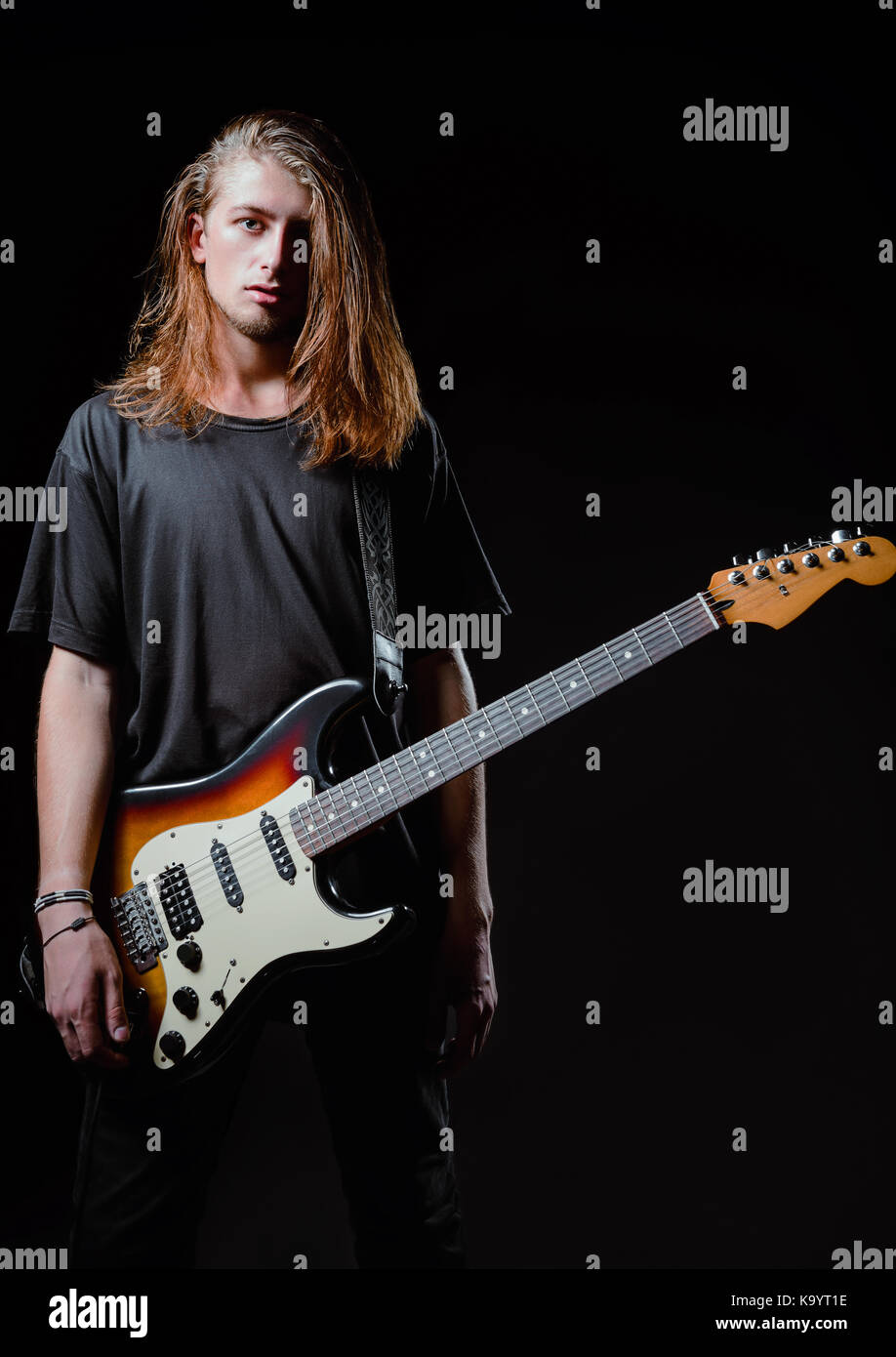 Dramatic Studio Portrait A Handsome Longhaired Young Man Rock