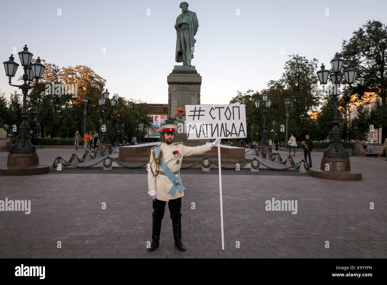 A man holds banner with inscription 'Stop Matilda' on Pushkin Square against the beginning of the screening Alexei Uchitel's film 'Matilda' in Moscow Stock Photo
