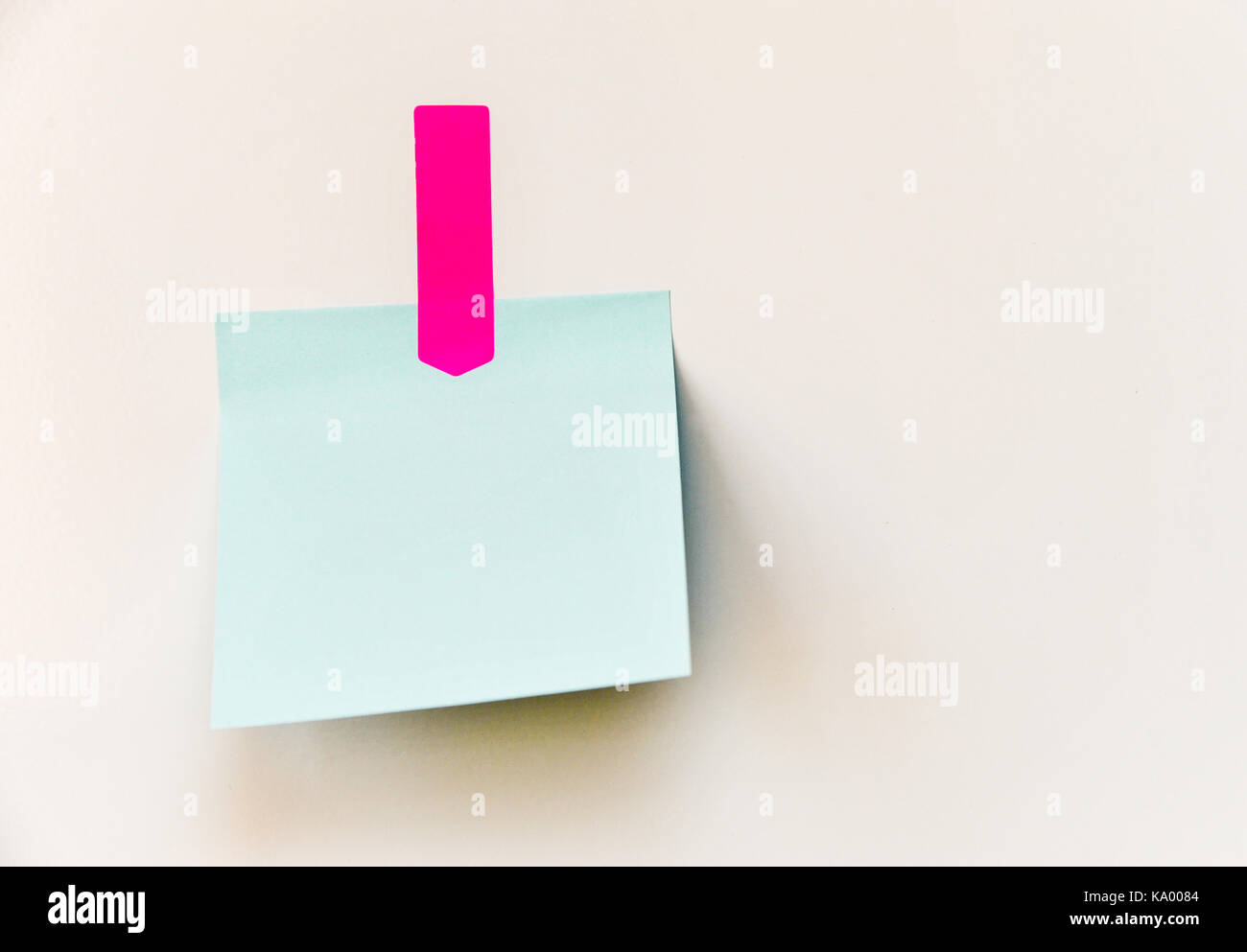 Blank Stickies or Post-It Notes Stuck to a Fridge. Stock Photo