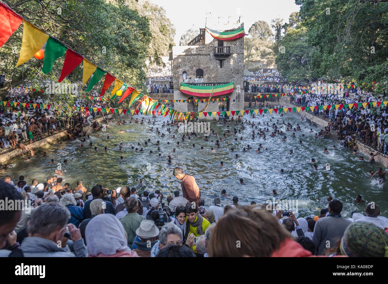 Crowd swimming in the Fasilides pond during a timkat ceremony in Gondar, Ethiopia Stock Photo