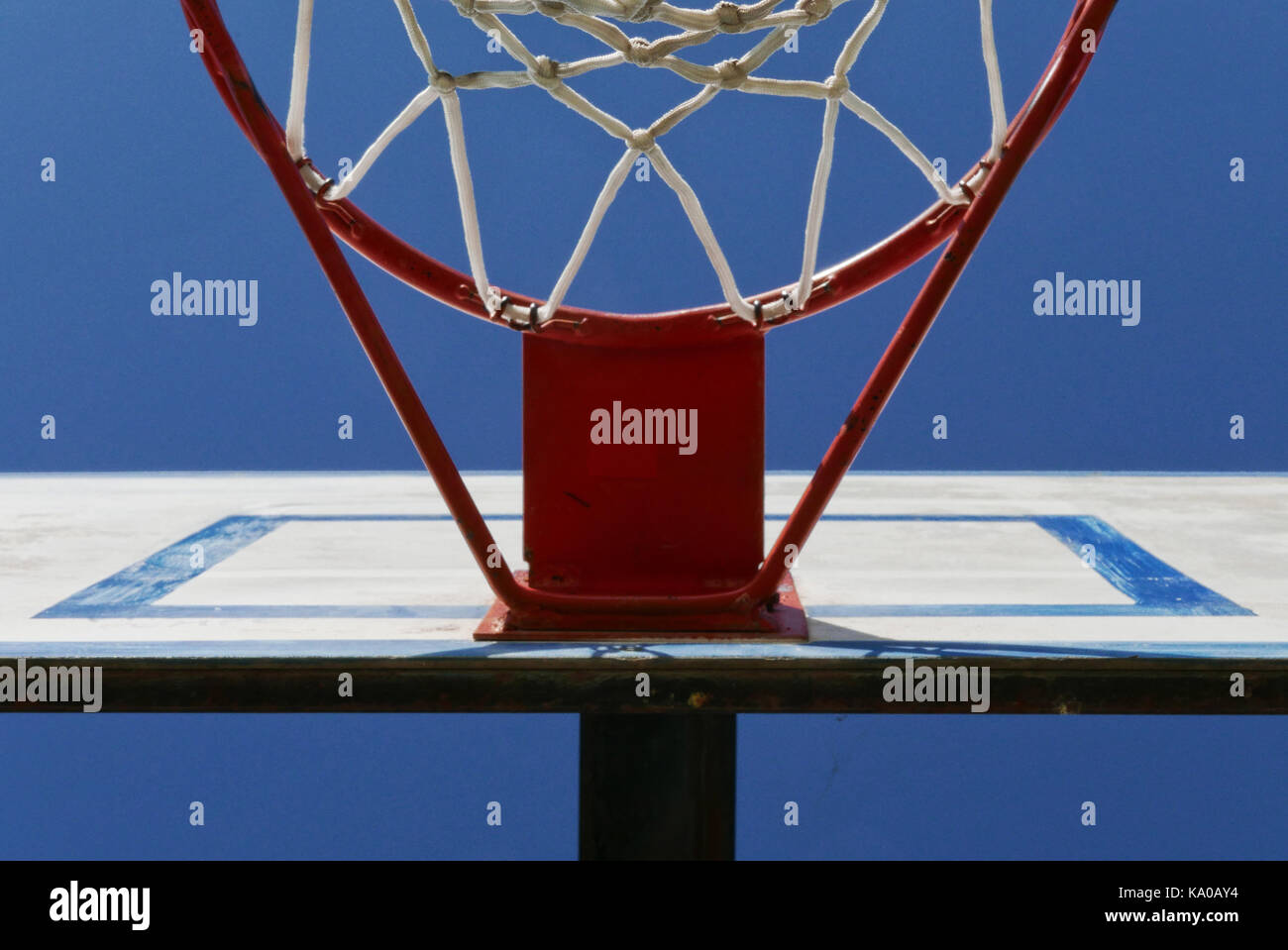 Basketball hoop, against blue sky, Italy Stock Photo