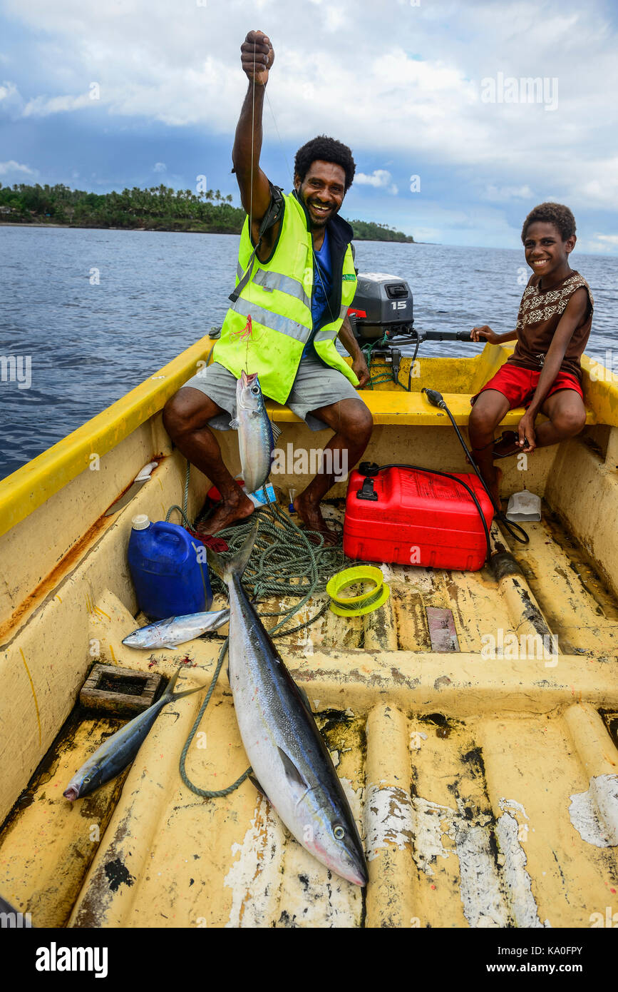 Fisherman in a boat while fishing, off Ambrym Island, South Seas, Vanuatu,  Oceania Stock Photo - Alamy