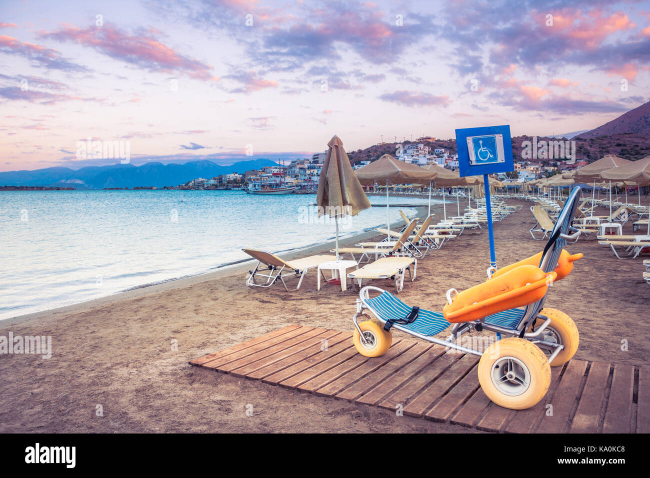 Beach wheel chair for disabled swimmers Stock Photo Alamy