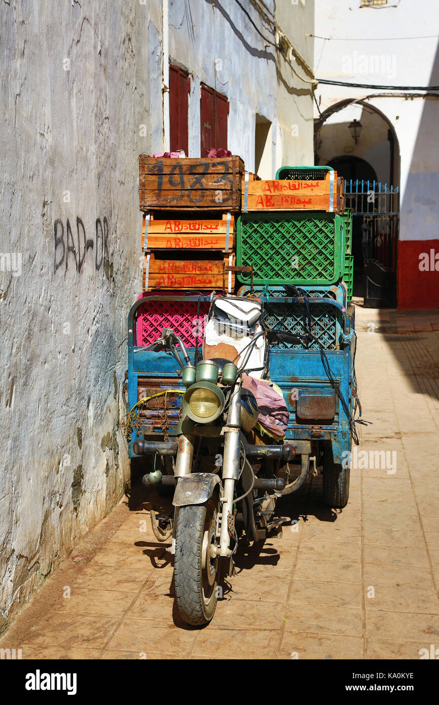 Street scene with a loaded motorcycle in the Medina of Rabat, Morocco Stock Photo