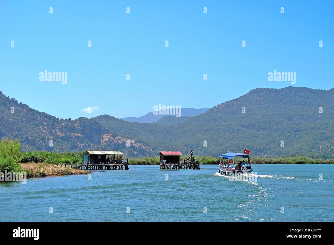 Excursion boats and fish trap on Dalyan River, Turkey Stock Photo