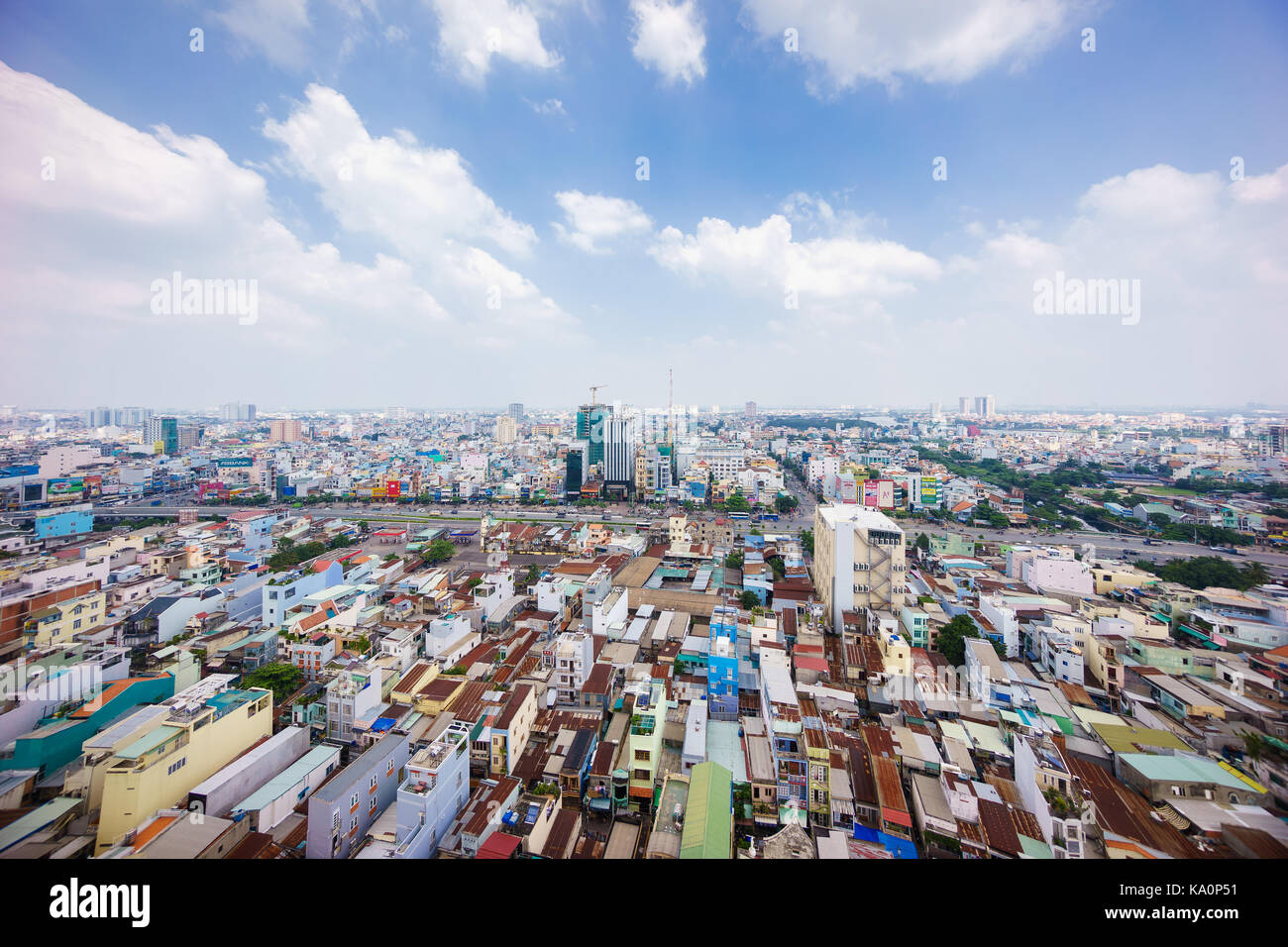 Ho Chi Minh city (or Saigon) skyline with colorful house, Vietnam. Saigon is the biggest city and economic center in Vietnam Stock Photo