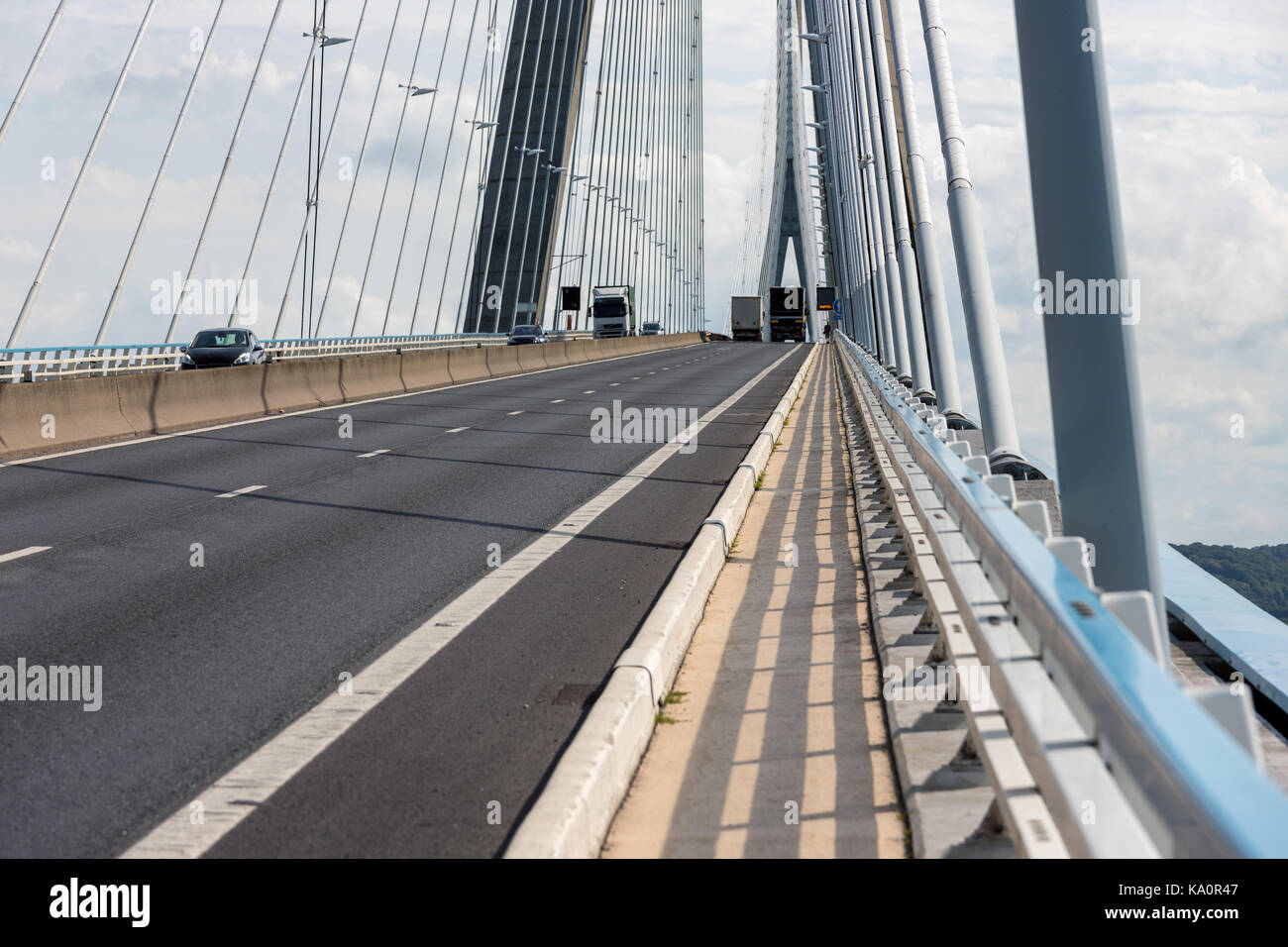 Highway with footpath at Pont de Normandie, French bridge over river