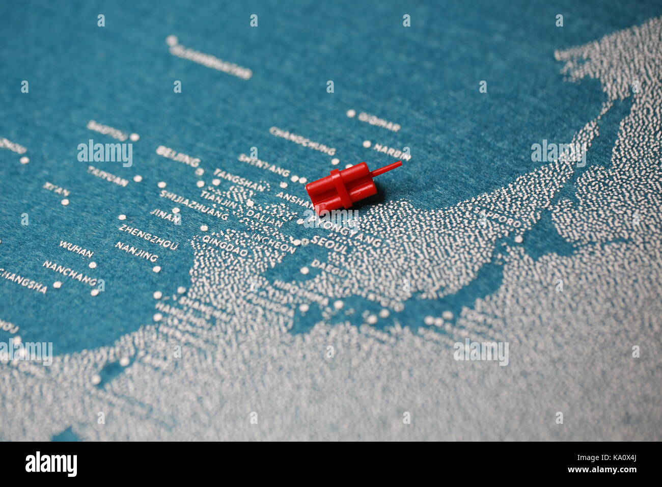 map on north korea with nuclear sign Stock Photo