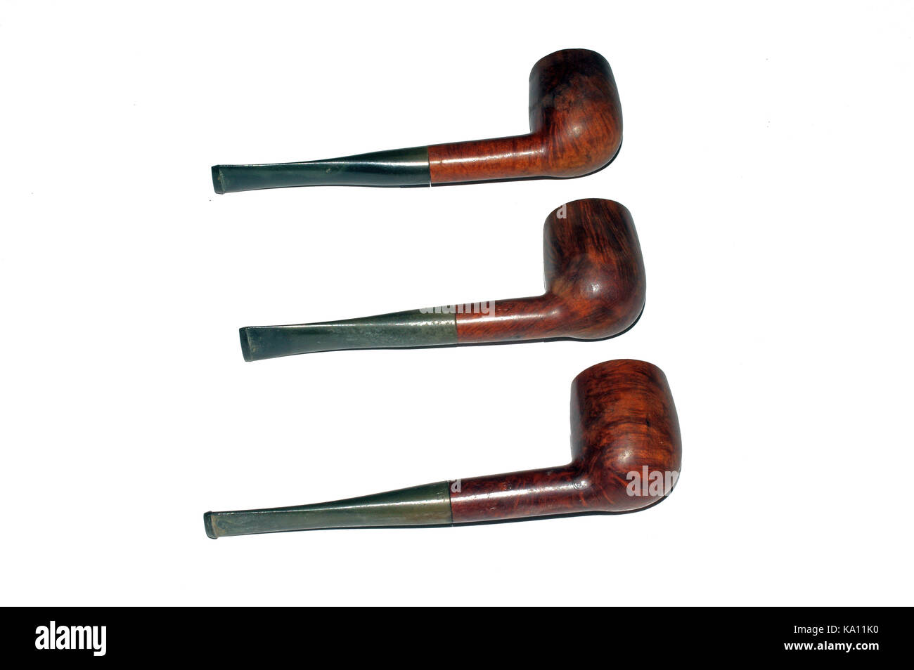 Tobacco pipes closeup on white background Stock Photo Alamy