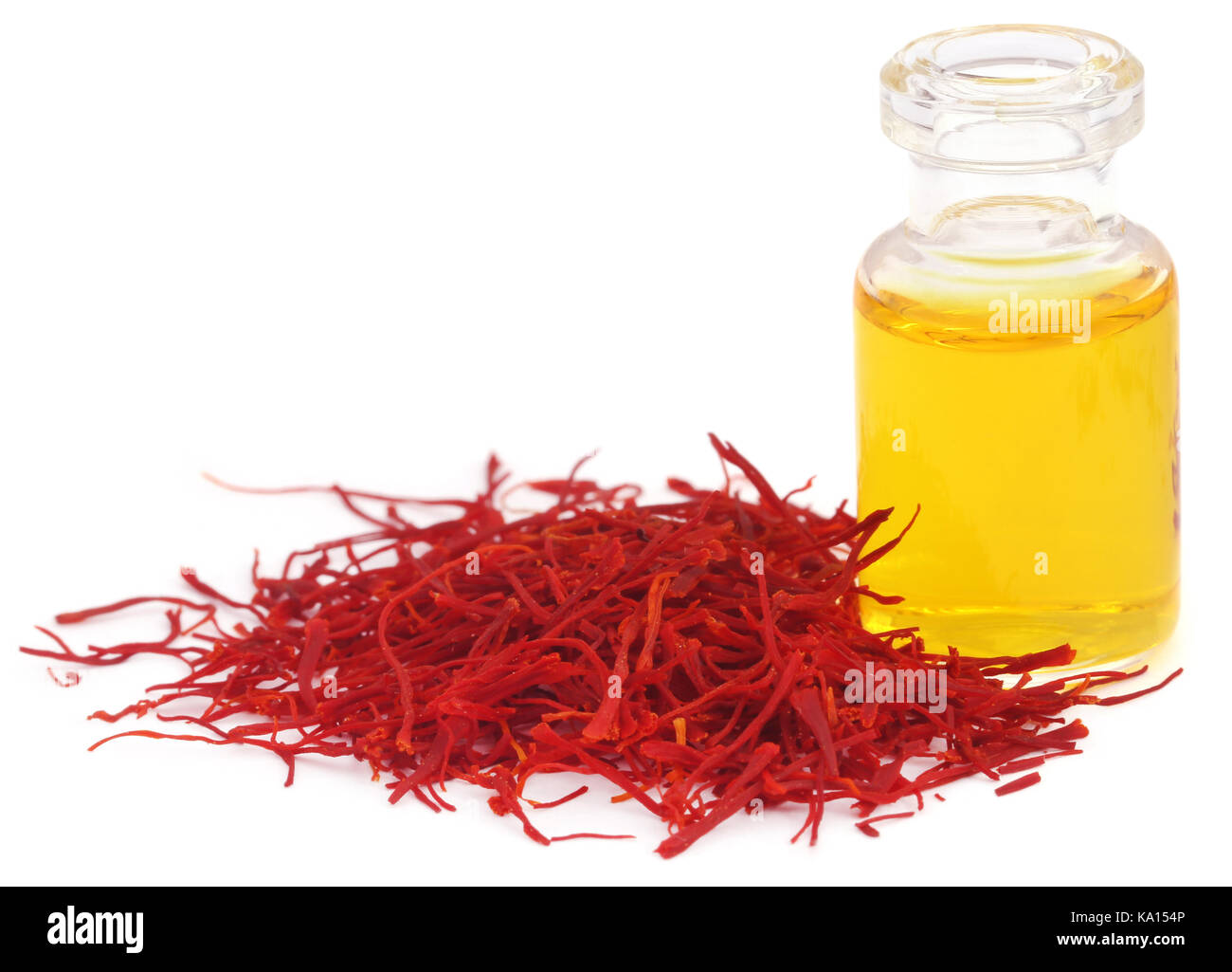 Closeup of Saffron with extract used as food additive over white background Stock Photo Alamy