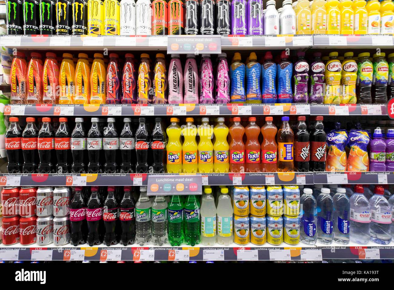 Fizzy drinks on display on a supermarket shelf Stock Photo Alamy