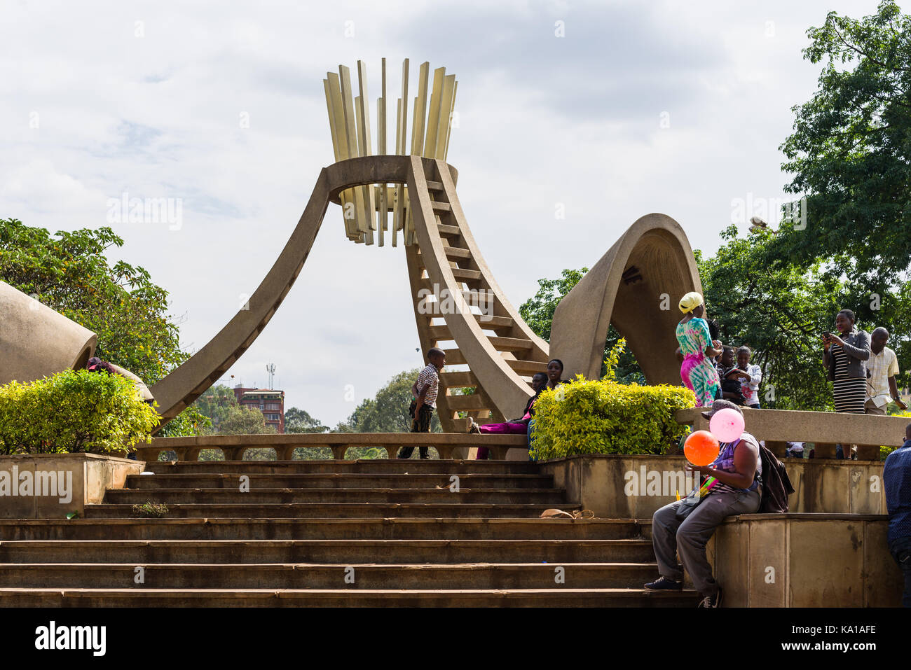 Water fountain monument built during President Moi's rule in the 1980s depicting love, peace and unity, Uhuru Park, Nairobi, Kenya, East Africa Stock Photo