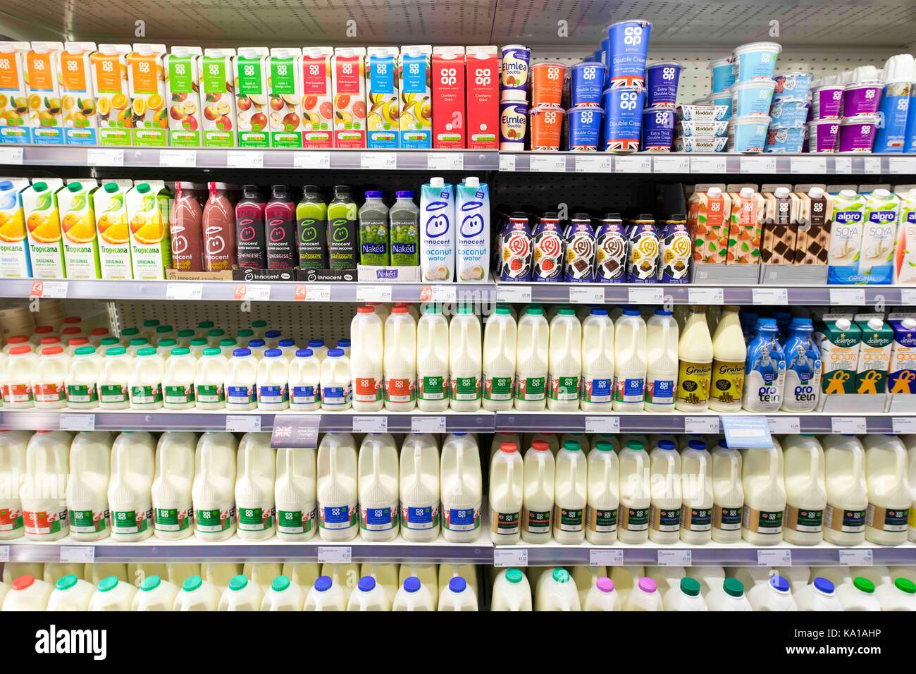 Fresh milk on display in a supermarket store Stock Photo Alamy