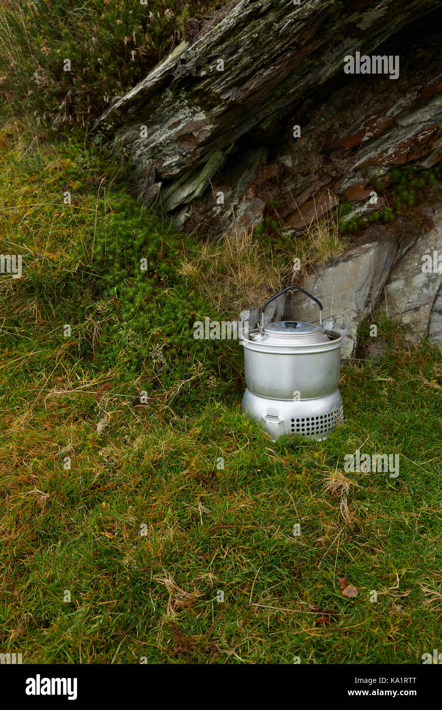 Trangia Camping Stove Boiling a Kettle Outdoors Wales UK Stock Photo
