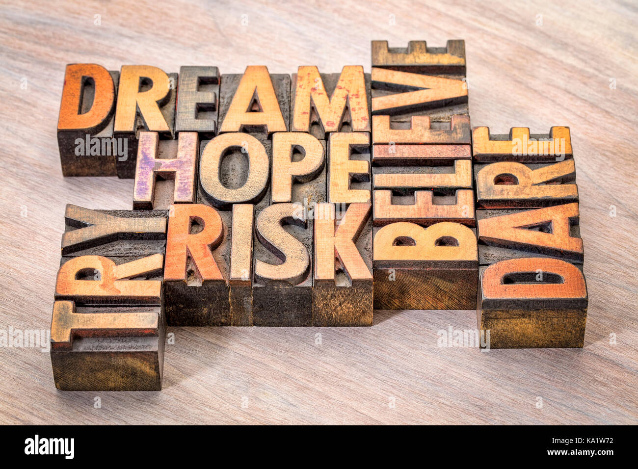 dream, hope, believe, dare, risk and try - inspirational word abstract in vintage letterpress wood type printing blocks Stock Photo