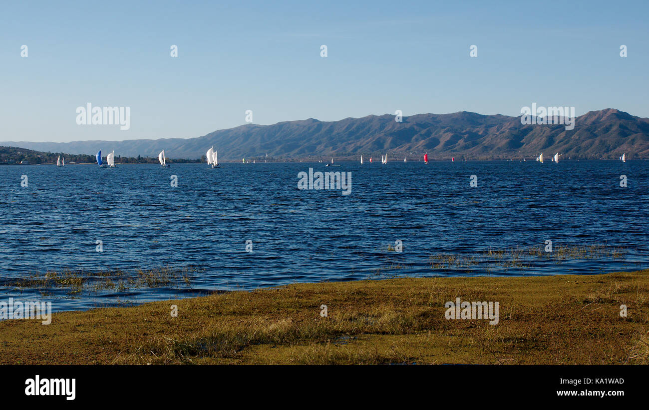 Villa Carlos Paz, Cordoba, Argentina - 2017: Sailboats in San Roque Lake. Stock Photo