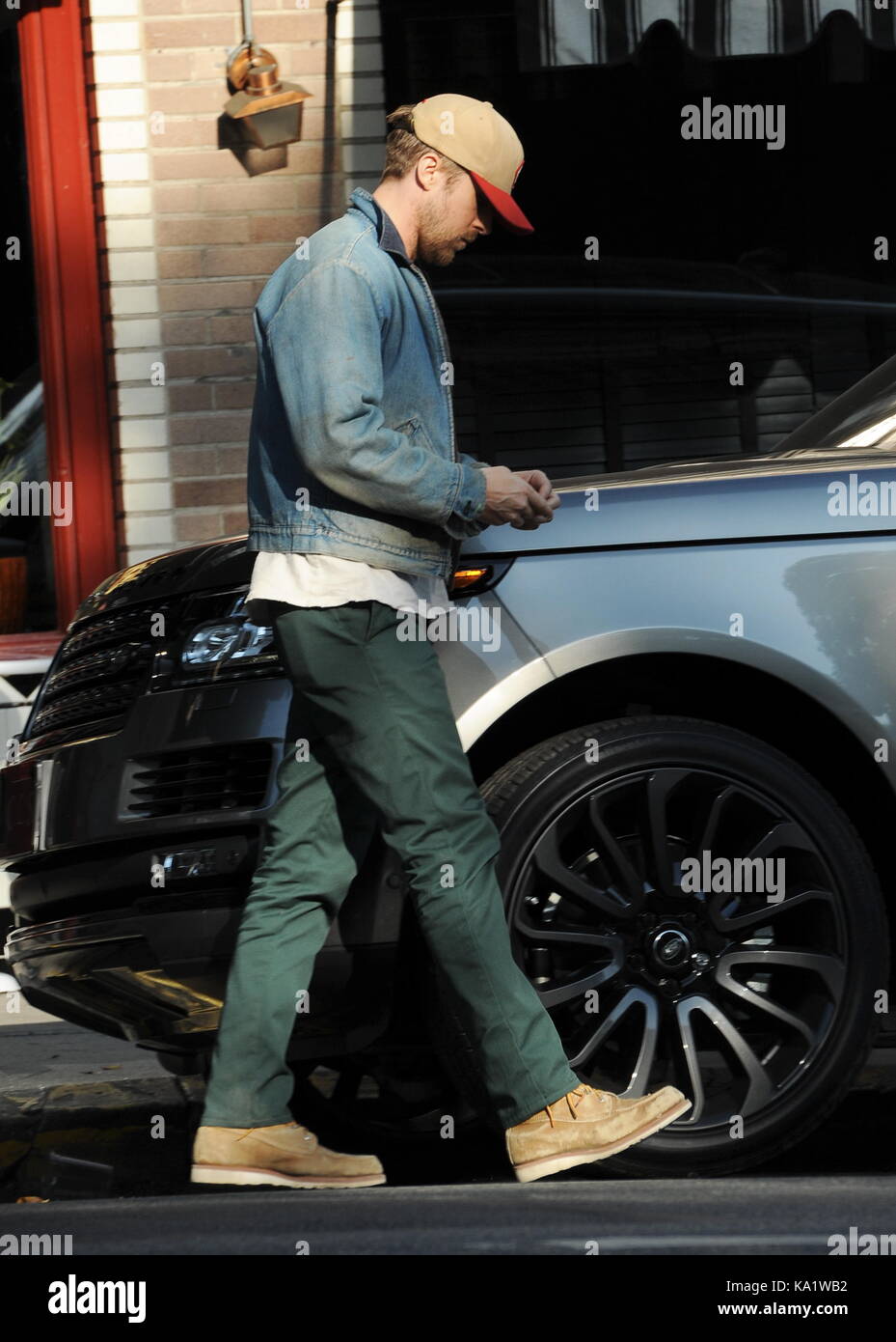 Ryan Gosling leaves Little Dom's Deli and gets into his car Featuring