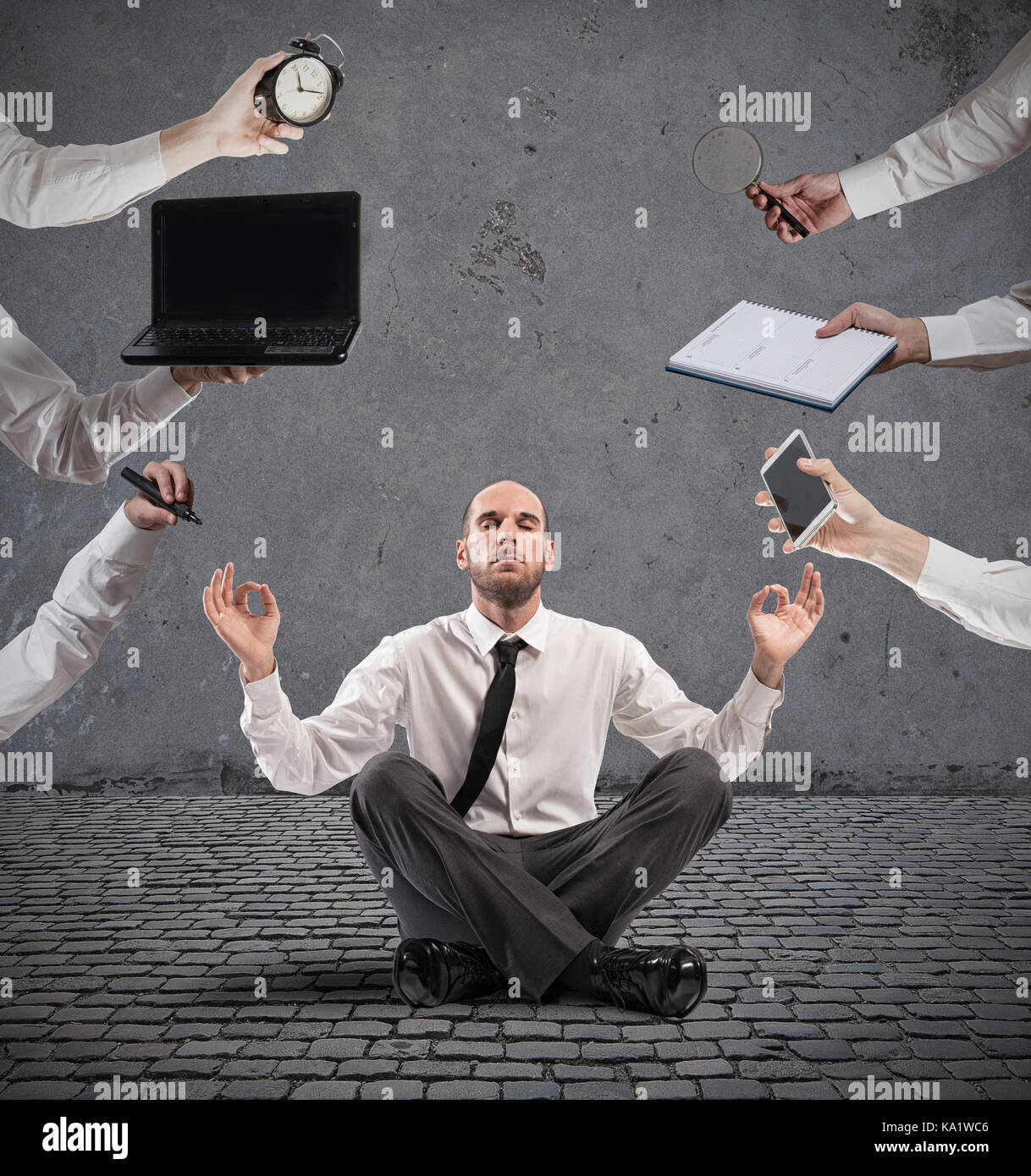 Relaxed businessman that does yoga during the work Stock Photo - Alamy