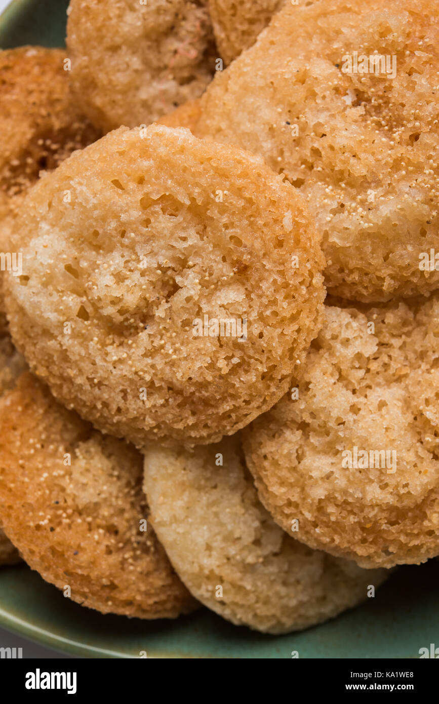 Stock Photo of Anarsa which is an authentic Maharashtrian sweet pastry-like dish especially made in the festive season in Maharashtra and Bihar, selec Stock Photo