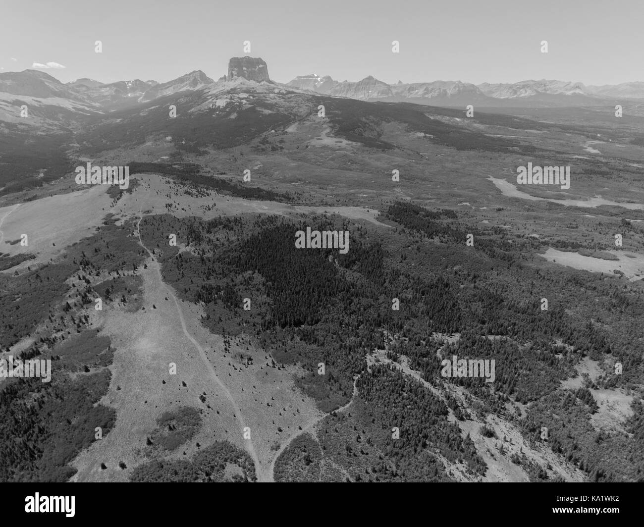 Aerial view to west of Chief Mountain and the Rocky Mountain Front from above the Chief Mountain Highway (MT 17), Glacier County, Montana, USA Stock Photo
