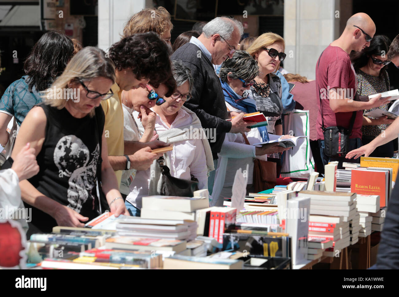 Books and buyers on a Street Books day in the island of Mallorca Stock Photo