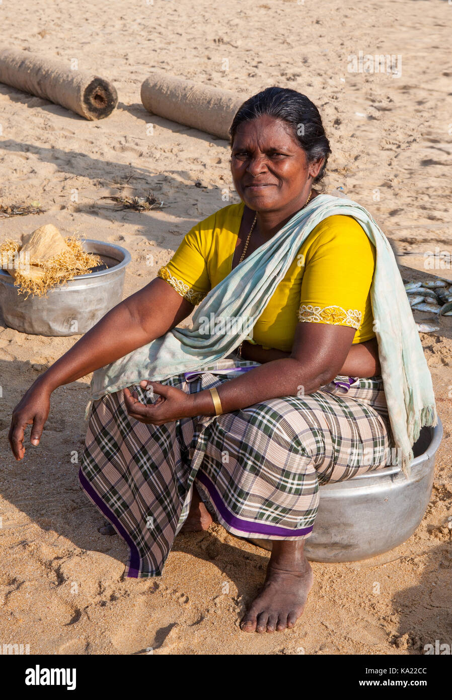 Rural residents in daily life. The woman on the shore waiting for the ...
