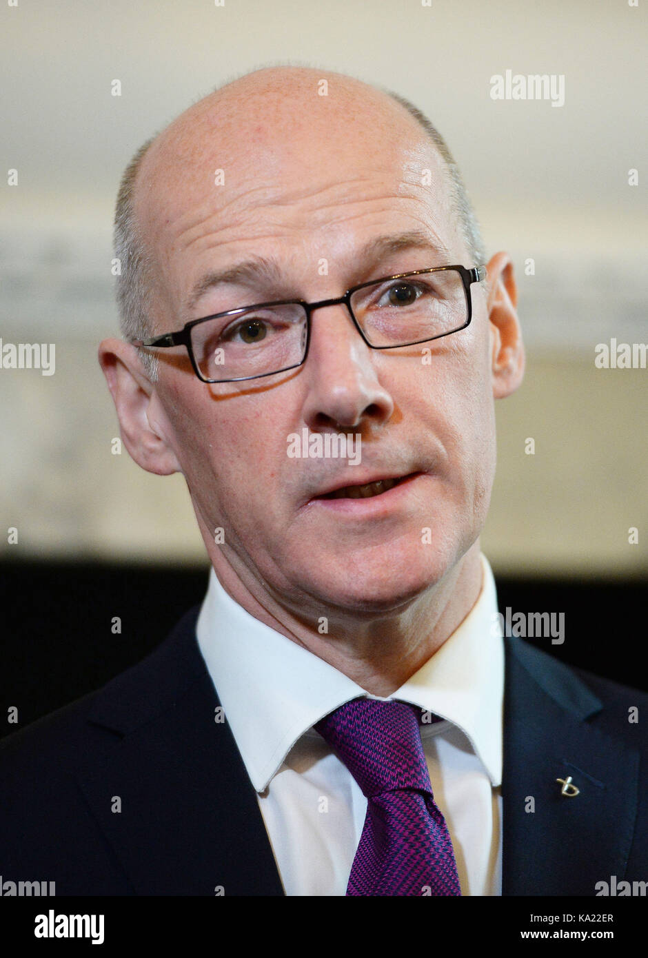 Scottish Deputy First Minister John Sweeney conducts a TV interview